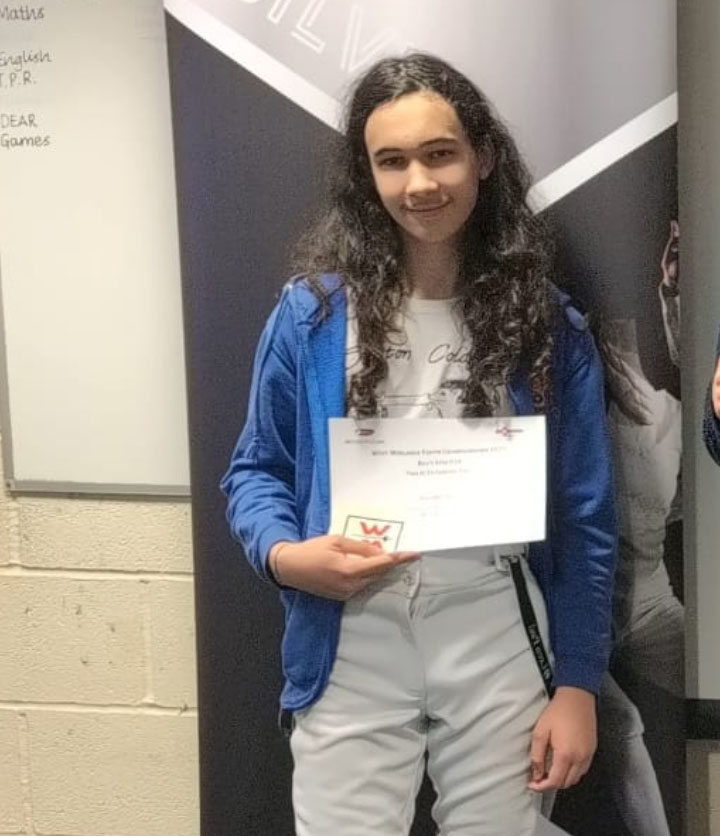 Daniel Bullock receiving his medal